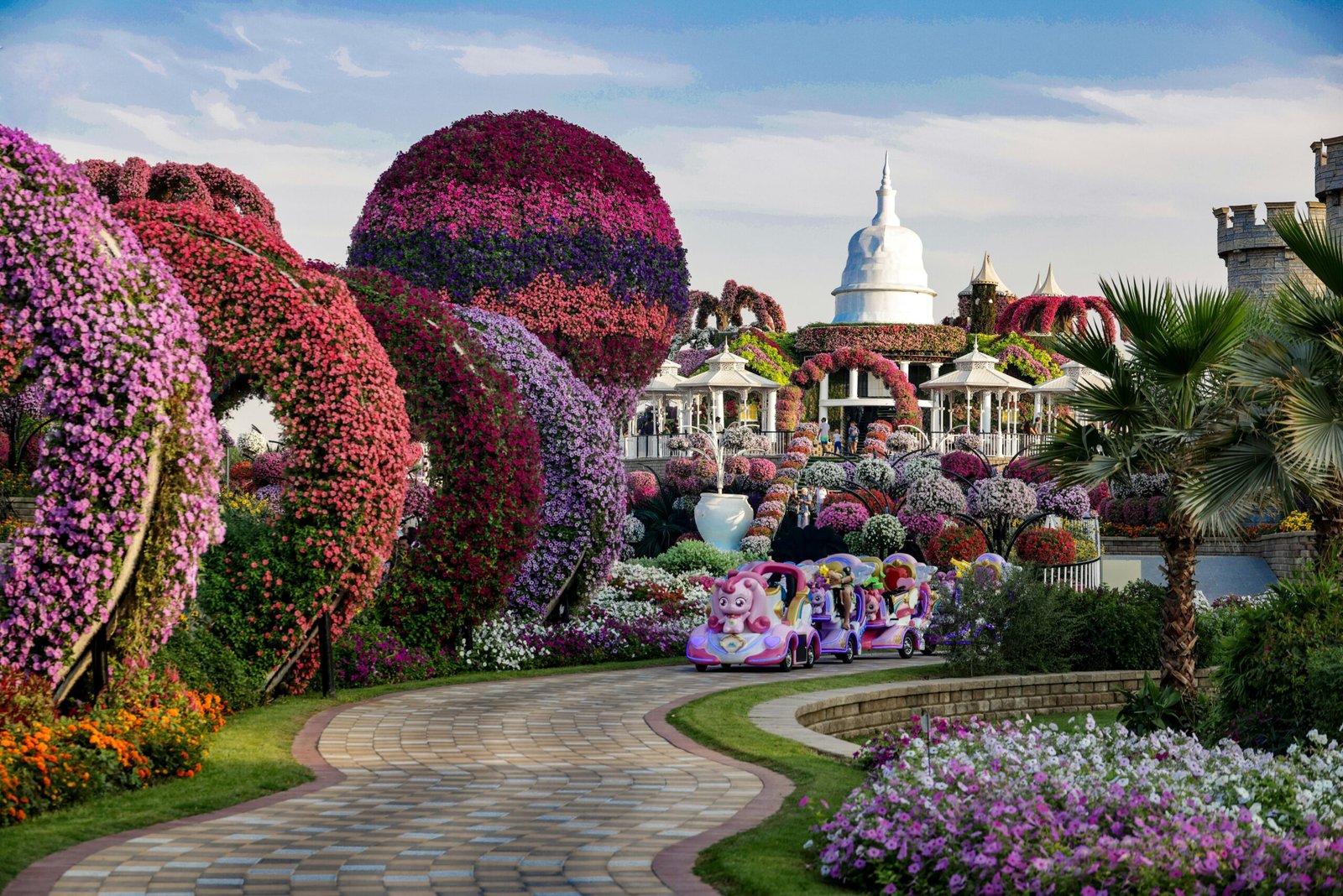 A stunning display of vibrant floral arches and landscapes at Dubai Miracle Garden.